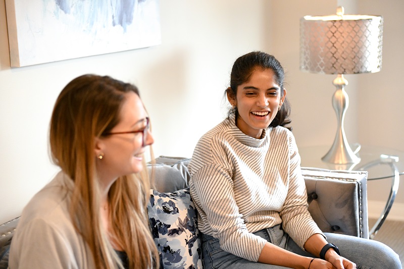 Two women laughing